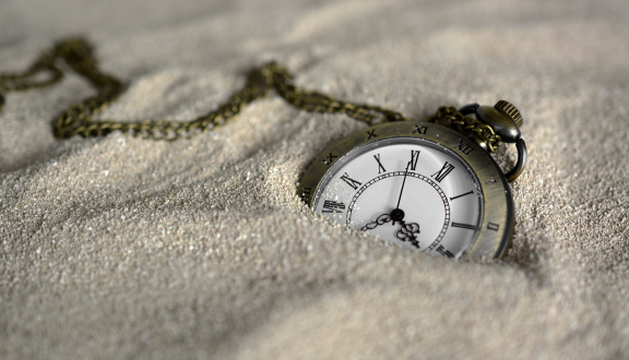 orologio nella sabbia