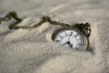 orologio nella sabbia