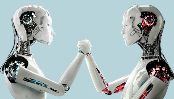 Due robot uno di fronte all'altro che si guardano e si stringono la mano